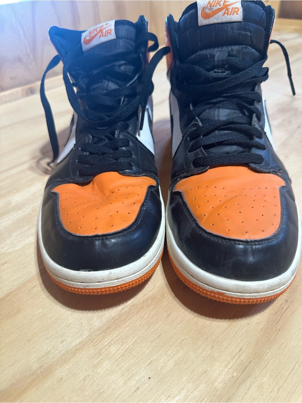 Nike Air High-Top Sneakers in Black and Orange